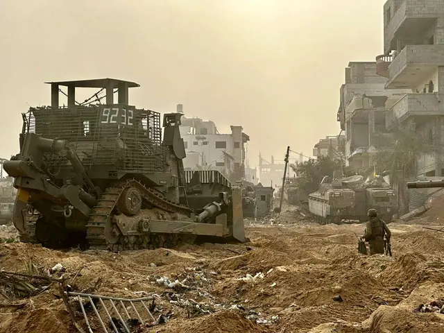 IDF Caterpillar D9 armored bulldozer with Israeli combat engineers in Gaza on November 2, 2023