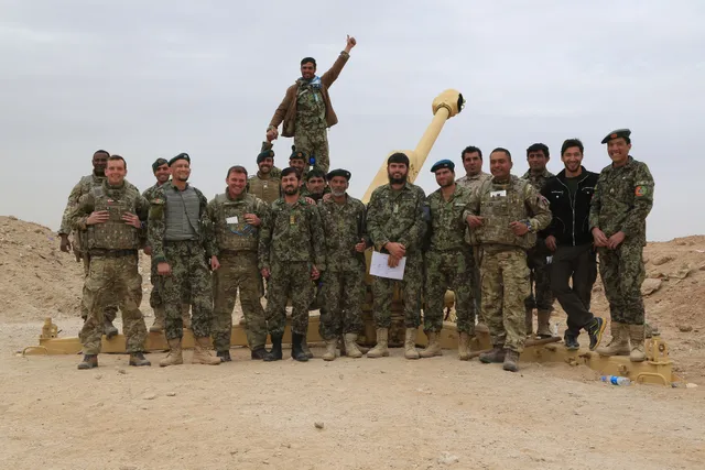 Afghan National Army soldiers firing a D-30 howitzer at Camp Shorabak in March 2014