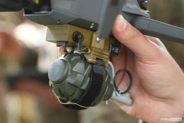 Ukrainian volunteer quadcopter fitted with an improvised grenade release system
