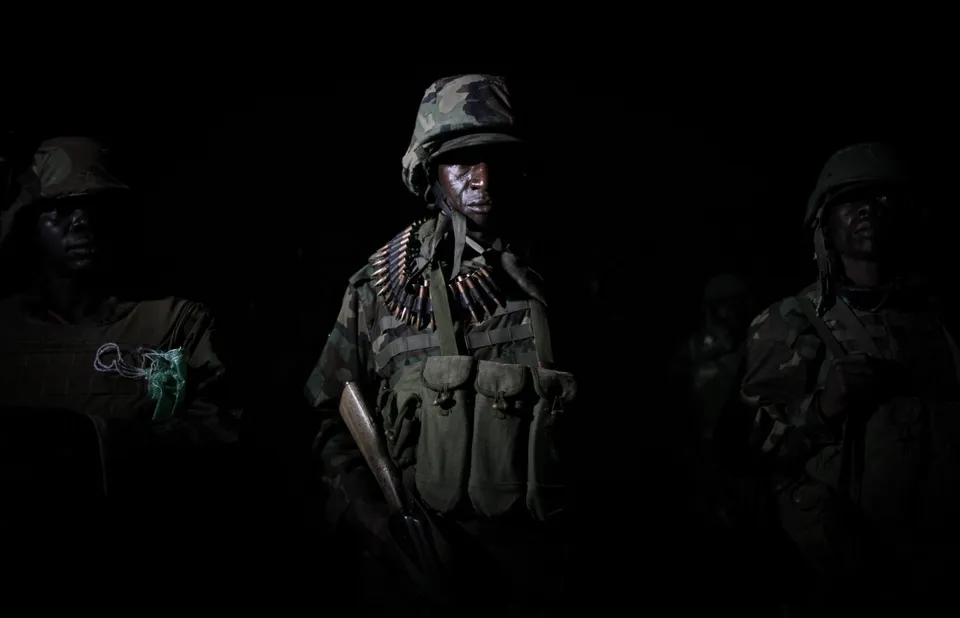 AMISOM troops forming up before a night operation southwest of Mogadishu