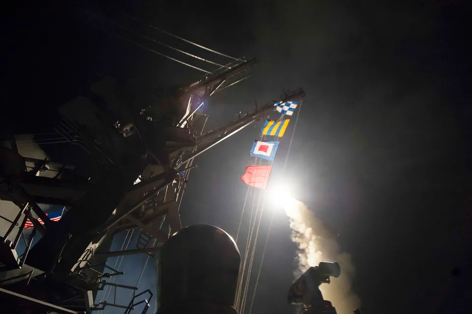 USS Ross firing a Tomahawk land attack missile toward Syria in April 2017