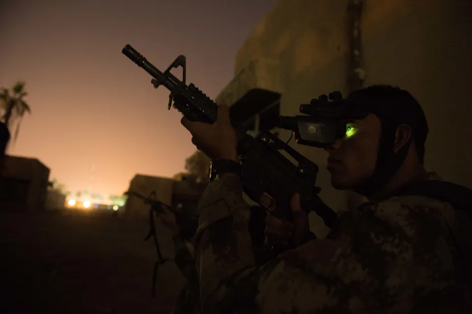 Iraqi Counter-Terrorism Service soldier using night vision during urban operations training near Baghdad in 2016